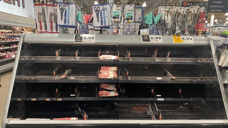 Empty shelves at the ShopRite in Huntington on Sunday morning.