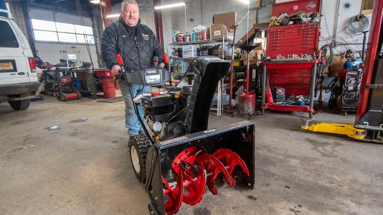 Timothy Sokol, owner of Elite Auto Parts in Lindenhurst, with...