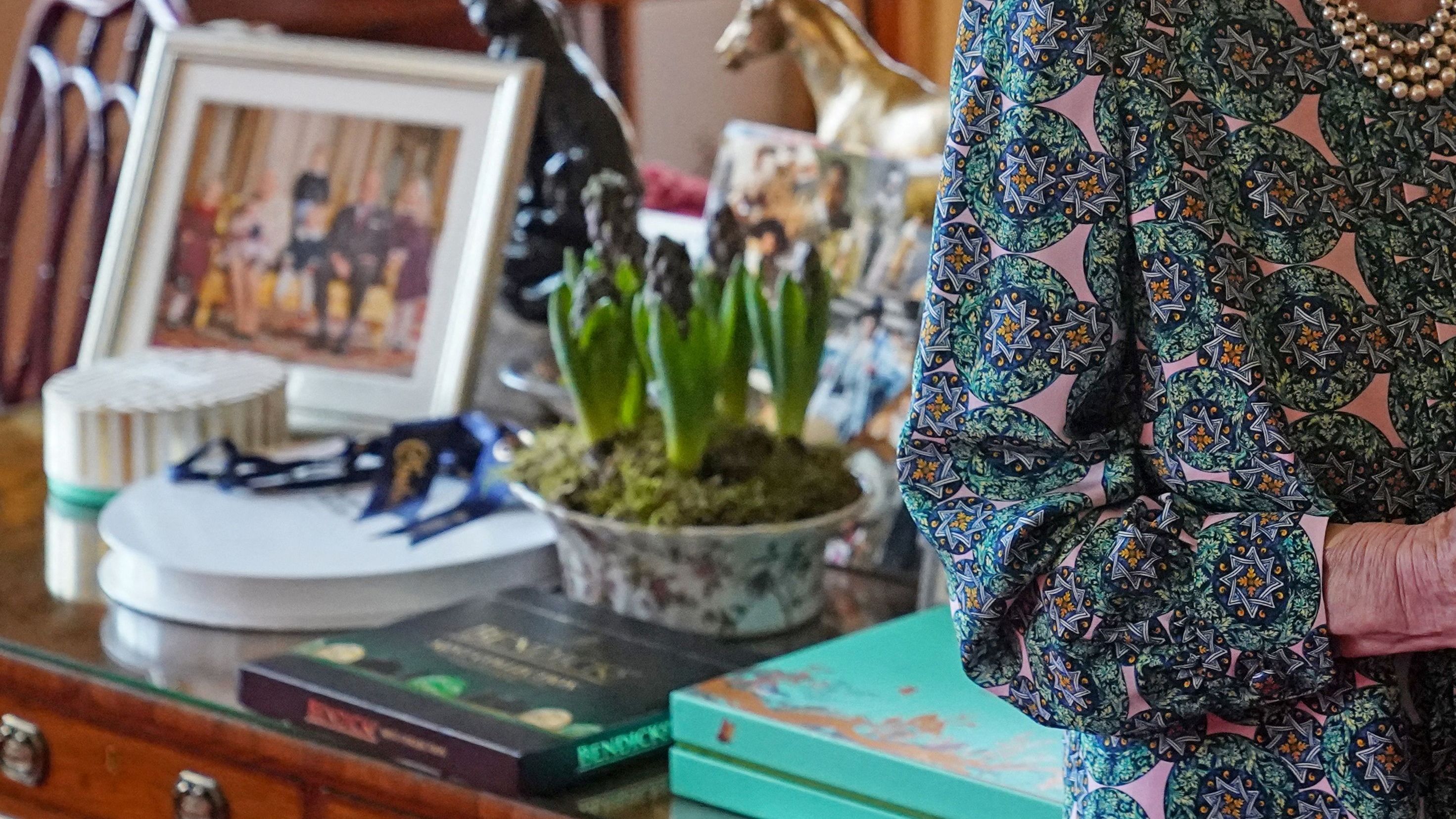 Queen Elizabeth II (L) speaks with incoming Defence Service Secretaries Major General Eldon Millar (R) during an in-person audience at the Windsor Castle, in Windsor, on February 16, 2022.