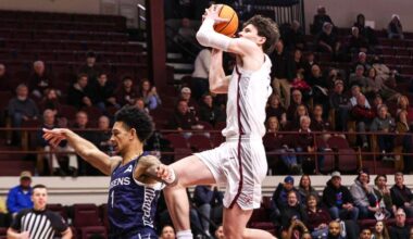 Knights close game on 7-0 run, beat Queens 78-75