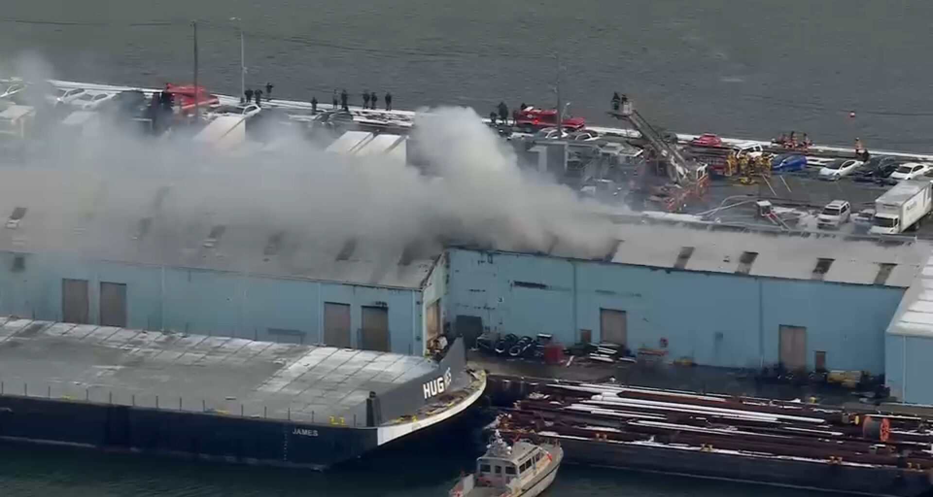 Wind-whipped fire tears through large warehouse in Brooklyn; no injuries