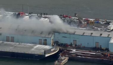 Wind-whipped fire tears through large warehouse in Brooklyn; no injuries