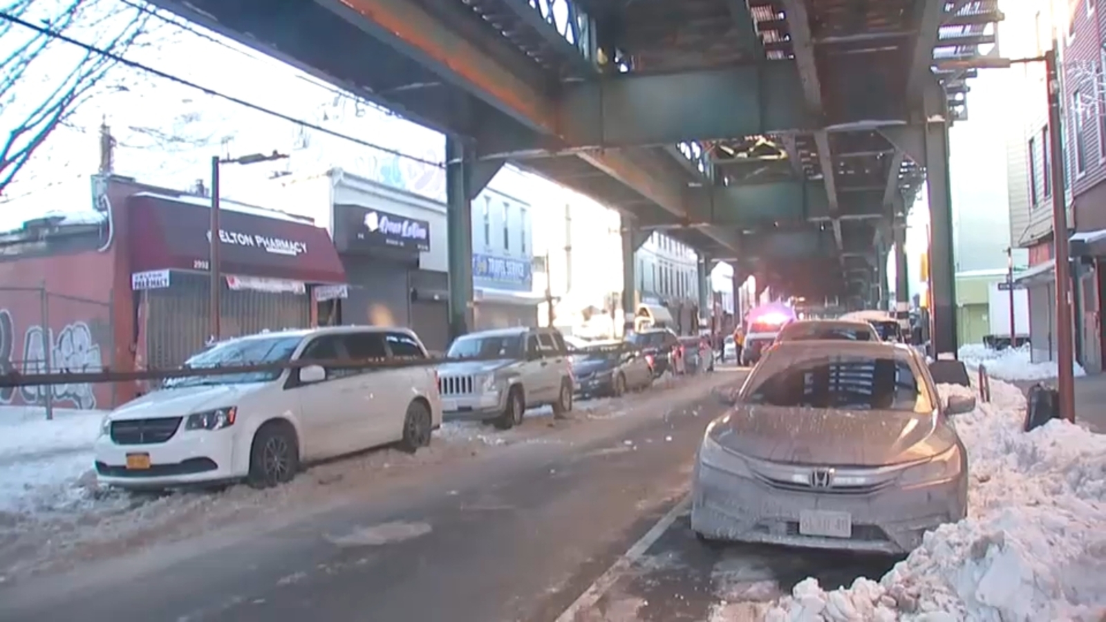 Cold causes cables to fall from elevated subway tracks onto cars below in Cypress Hills, Brooklyn