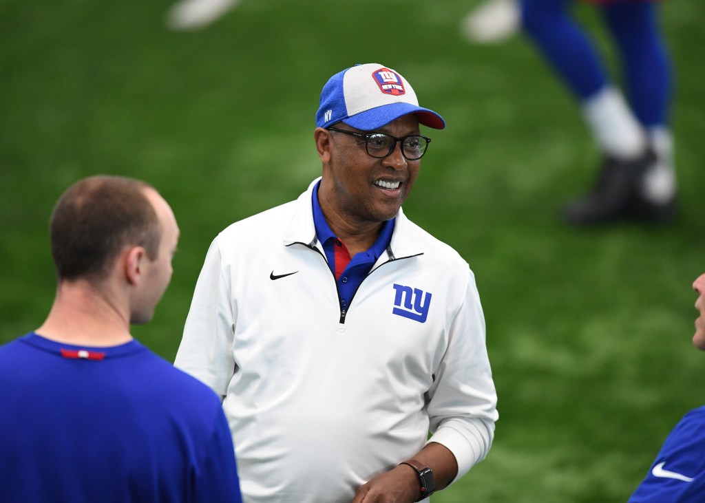 Ronnie Barnes wearing a New York Giants cap and jacket.