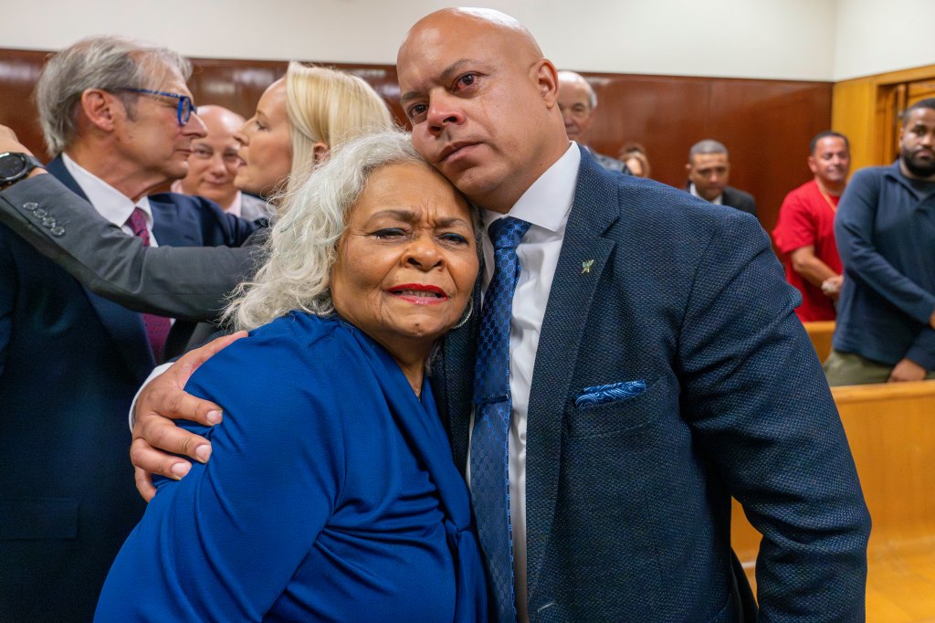 Jon-Adrian Velazquez embracing his mother in court after his homicide conviction was vacated.