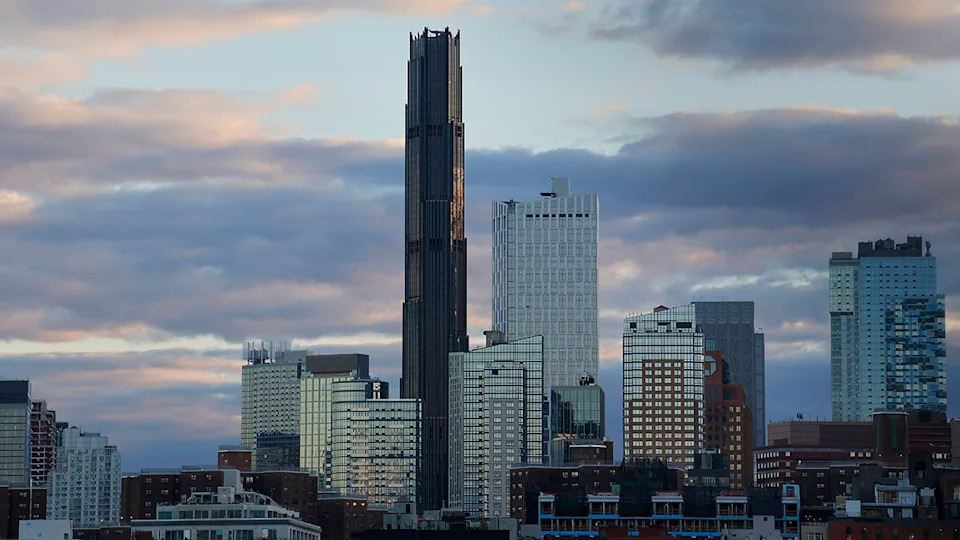 NEW YORK, NY - NOVEMBER 11: The sun sets on the skyline of Brooklyn and the Brooklyn Tower on November 11, 2023, in New York City.  (Photo by Gary Hershorn/Getty Images)
