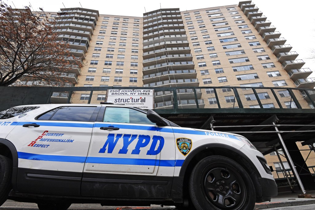 NYPD vehicle parked outside 2500 Johnson Avenue in the Bronx.