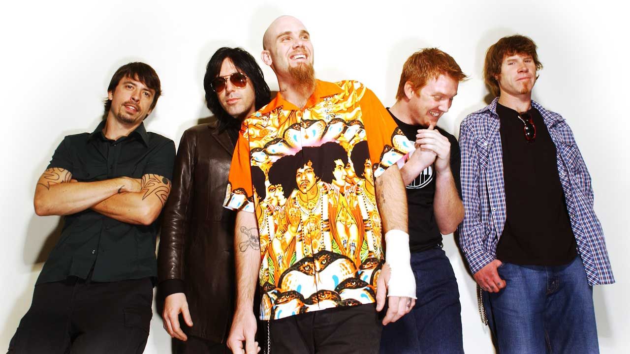 Queens Of The Stone Age in 2002, studio portrait