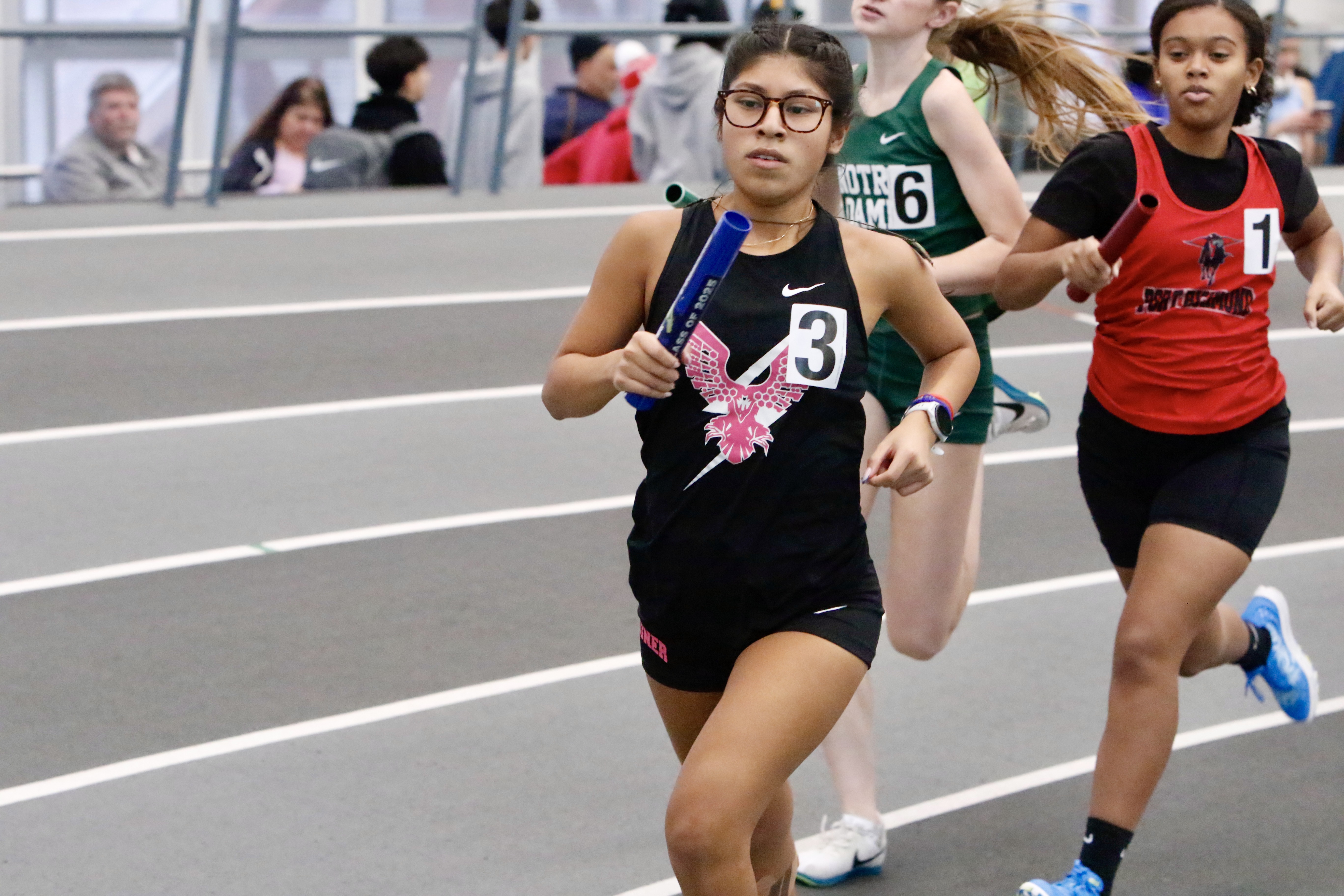 Susan Wagner's Melisa Davila runs a leg of the Falcons' winning 4x800 meter relay at the Staten Island High School Indoor Track and Field Championship on Jan. 18, 2026.