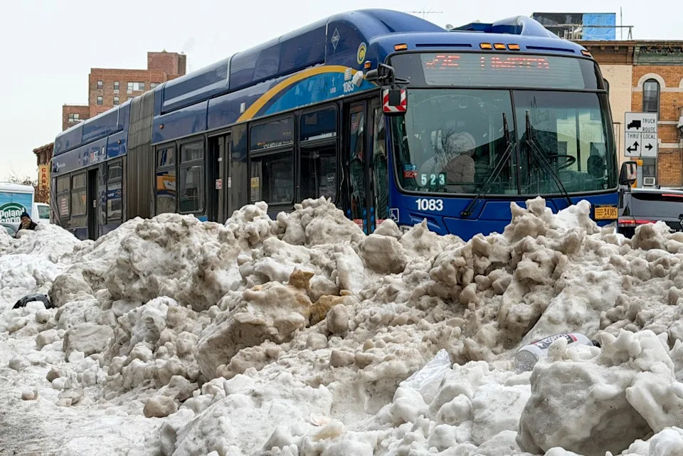 Many bus riders are upset at the bus stops that are still plagued with piles of snow. Paul Martinka