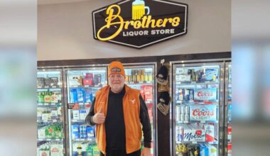 Following an extensive football coaching career, Cam Innes now coaches customers in their beverage choices at Brothers Liquor Store, where &ldquo;they keep me young… we have some fun.&rdquo; (Lynda Innes photo)