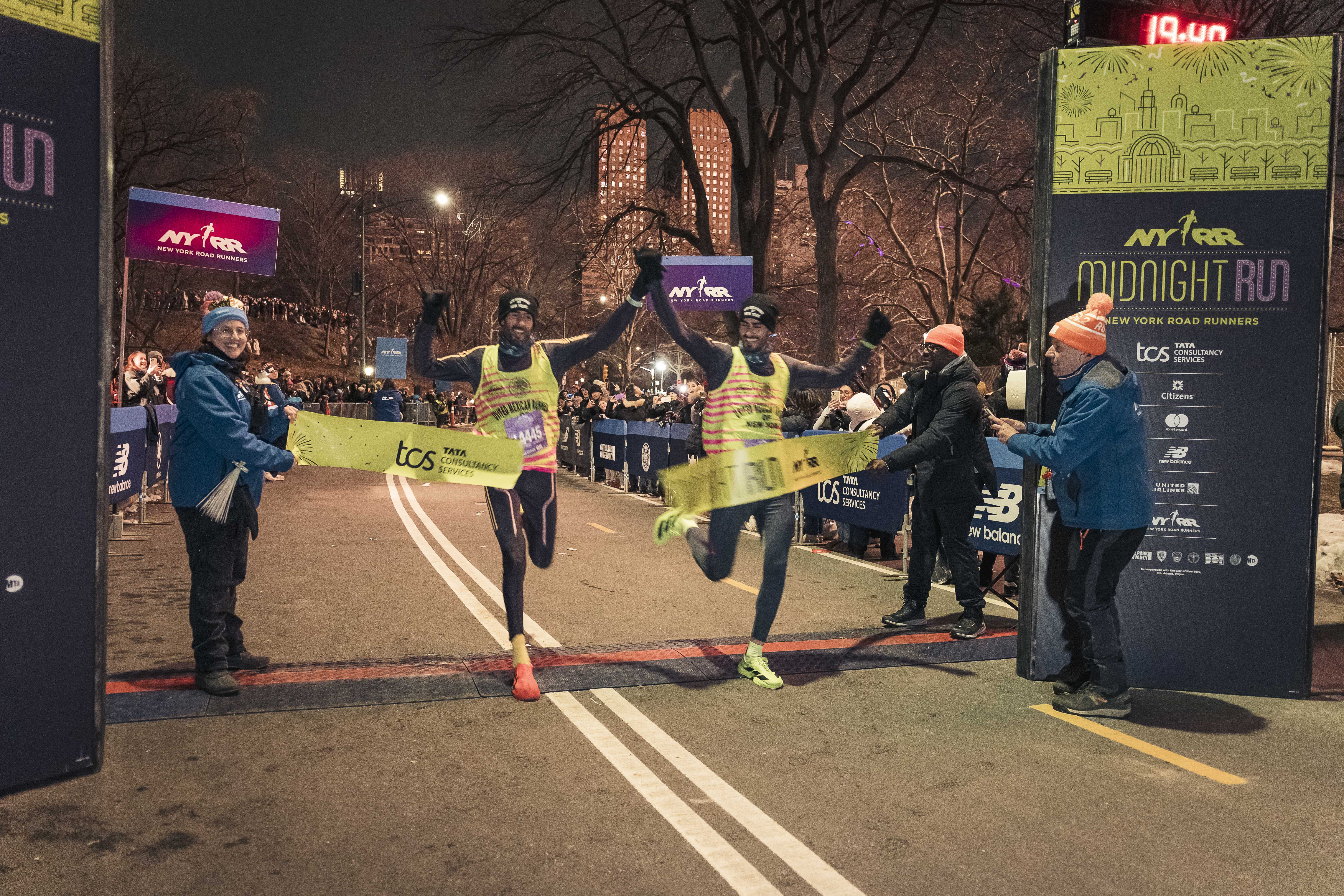Moroccan brothers Jaouad El Jazouli and Issame El Jazouli pictured first at the finish line.