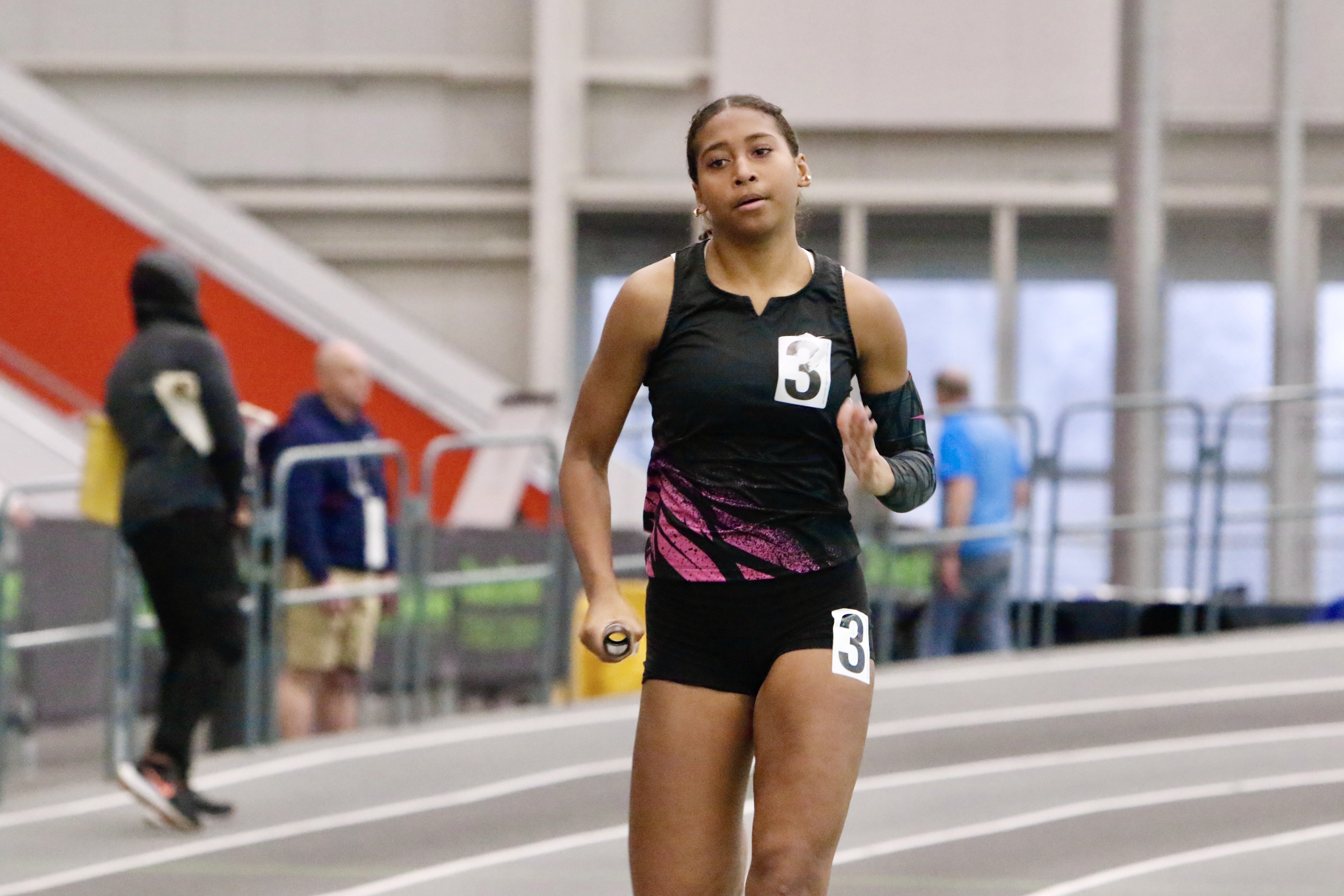 Curtis' Camille Banks runs a leg of the Warriors' winning 4x200 meter relay at the Staten Island High School Indoor Track and Field Championship on Jan. 18, 2026.