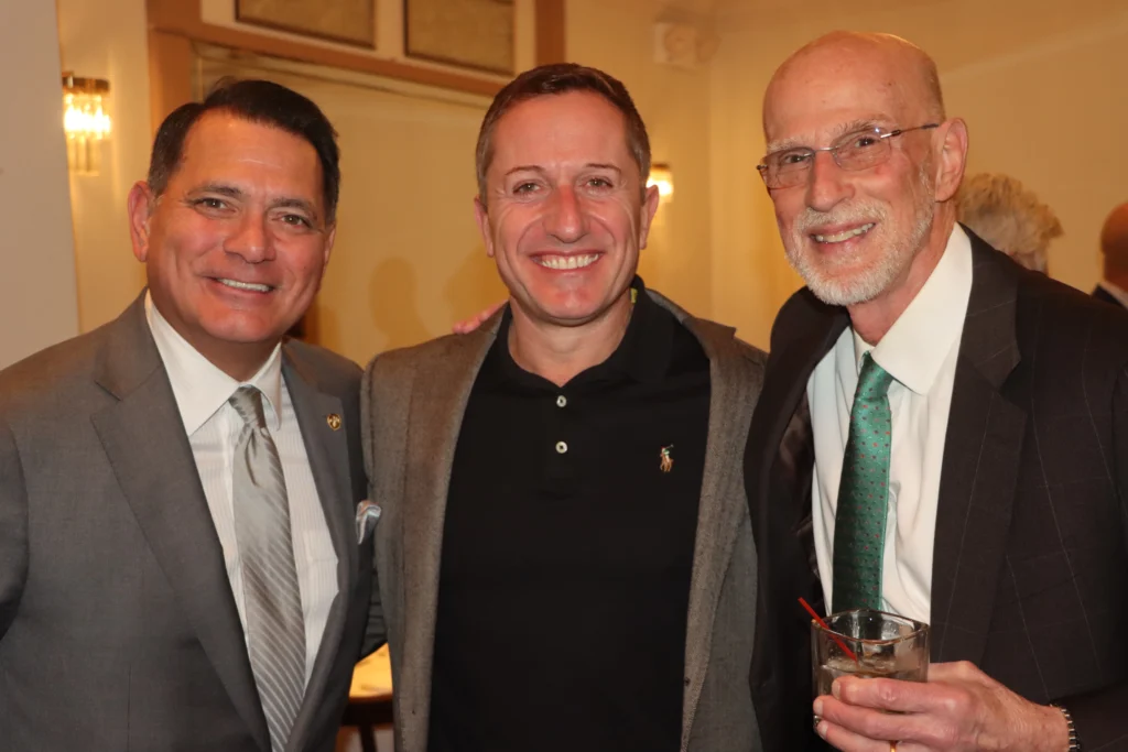Chris Caputo, Esq., left, Hon. Thomas Aliotta, right, and guest. Brooklyn Eagle photo by Mario Belluomo