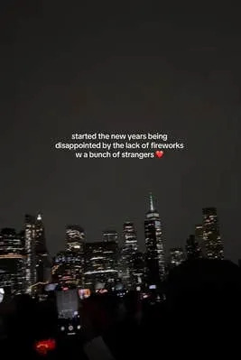 Cloudy night sky video from Brooklyn. Text overlay reads, "started the new years being disappointed by the lack of fireworks [with] a bunch of strangers"