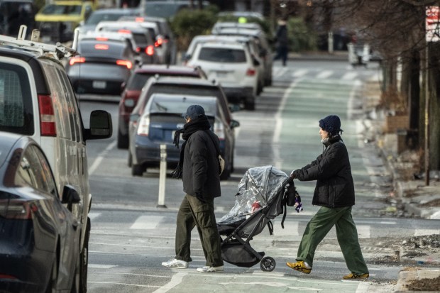 The stalled street redesign on McGuinness Boulevard will include protected bike lanes in both directions of travel on the thoroughfare, which has been among the more dangerous stretches for pedestrians and cyclists. (Michael Appleton / Mayoral Photography Office)