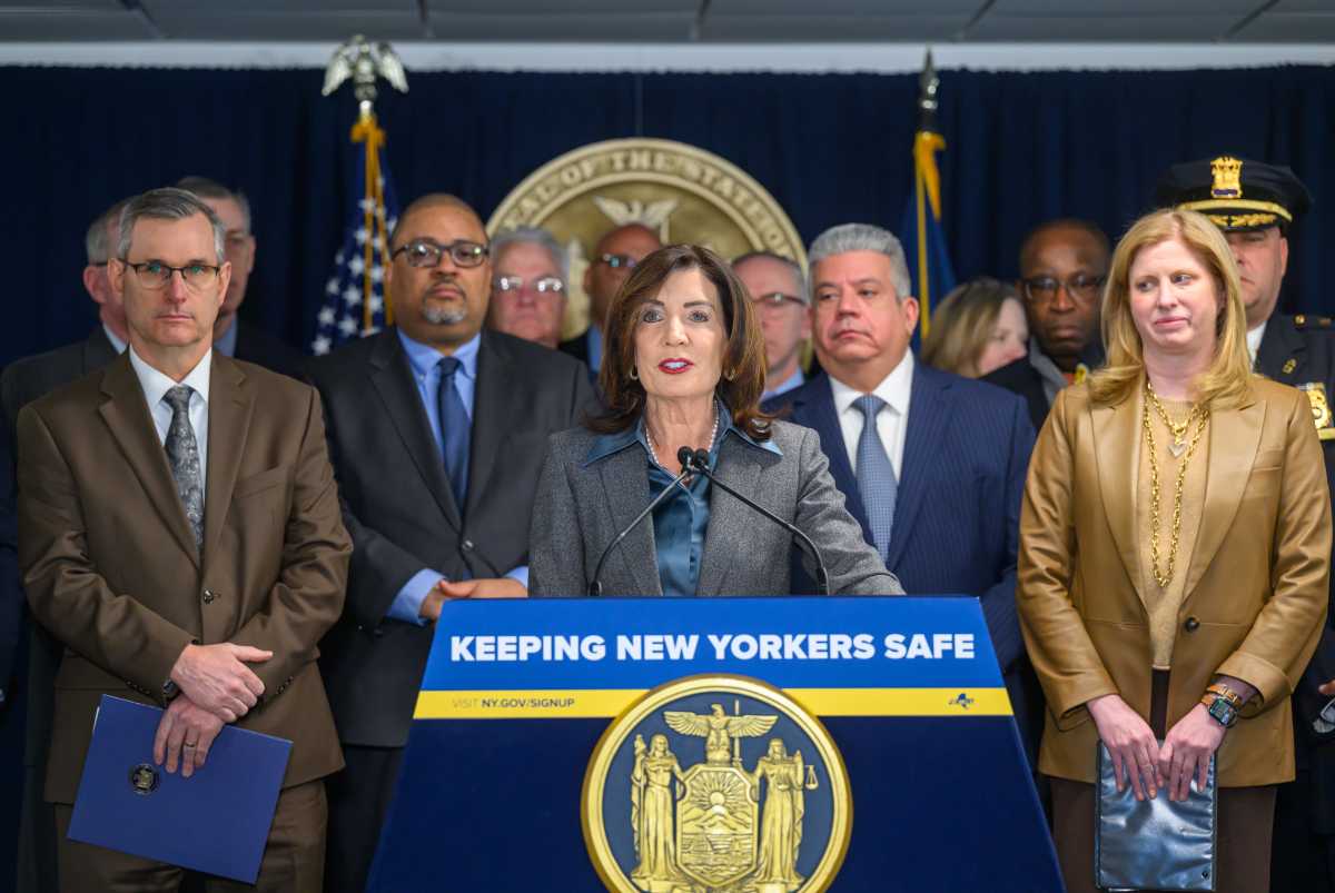 Hochul with elected officials announcing plan to stop ICE cooperation with NY police