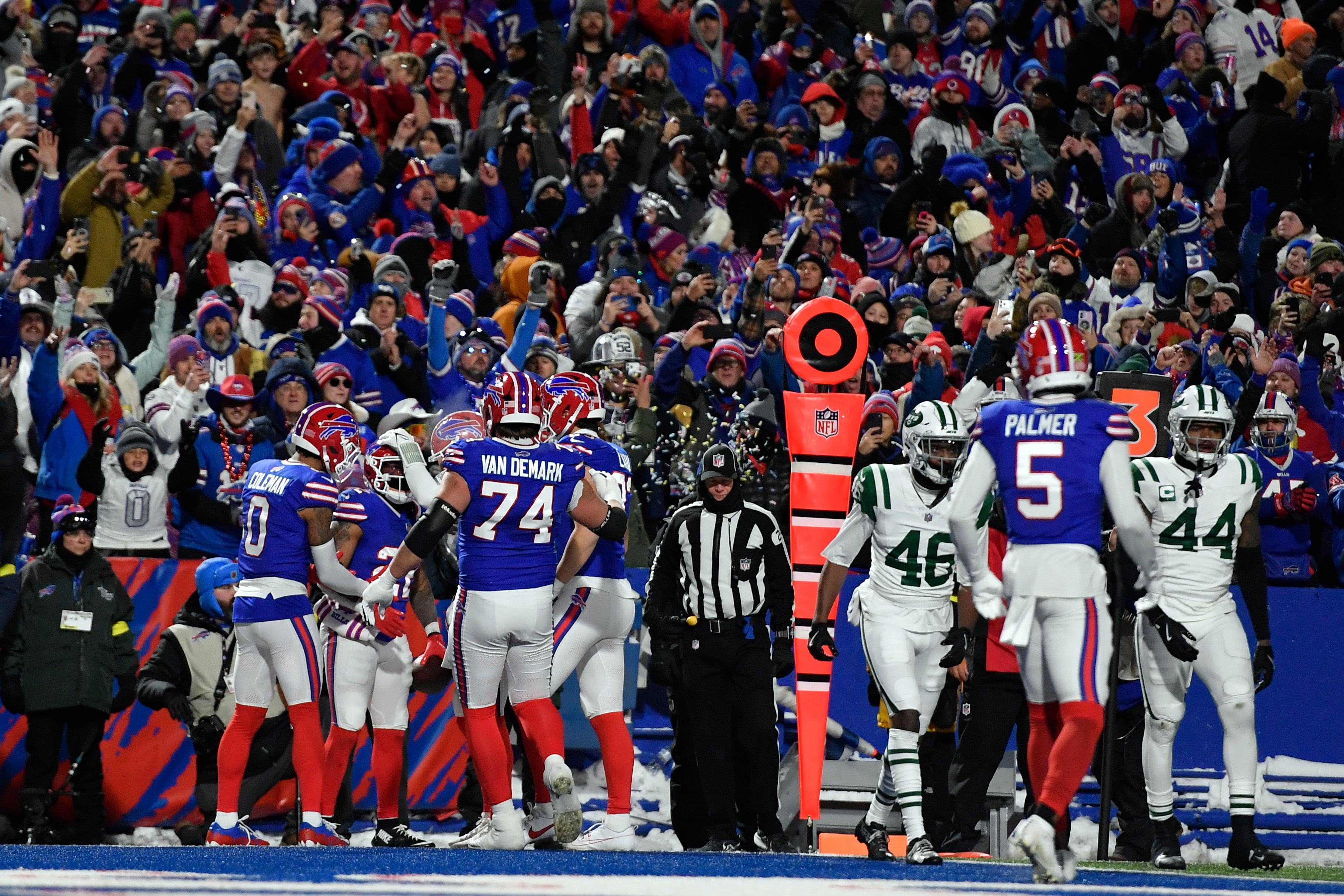 Buffalo Bills players celebrate after running back Ray Davis (22) scored a touchdown against the New York Jets in the first half of an NFL football game Sunday, Jan. 4, 2026, in Orchard Park, N.Y. (AP Photo/Adrian Kraus)