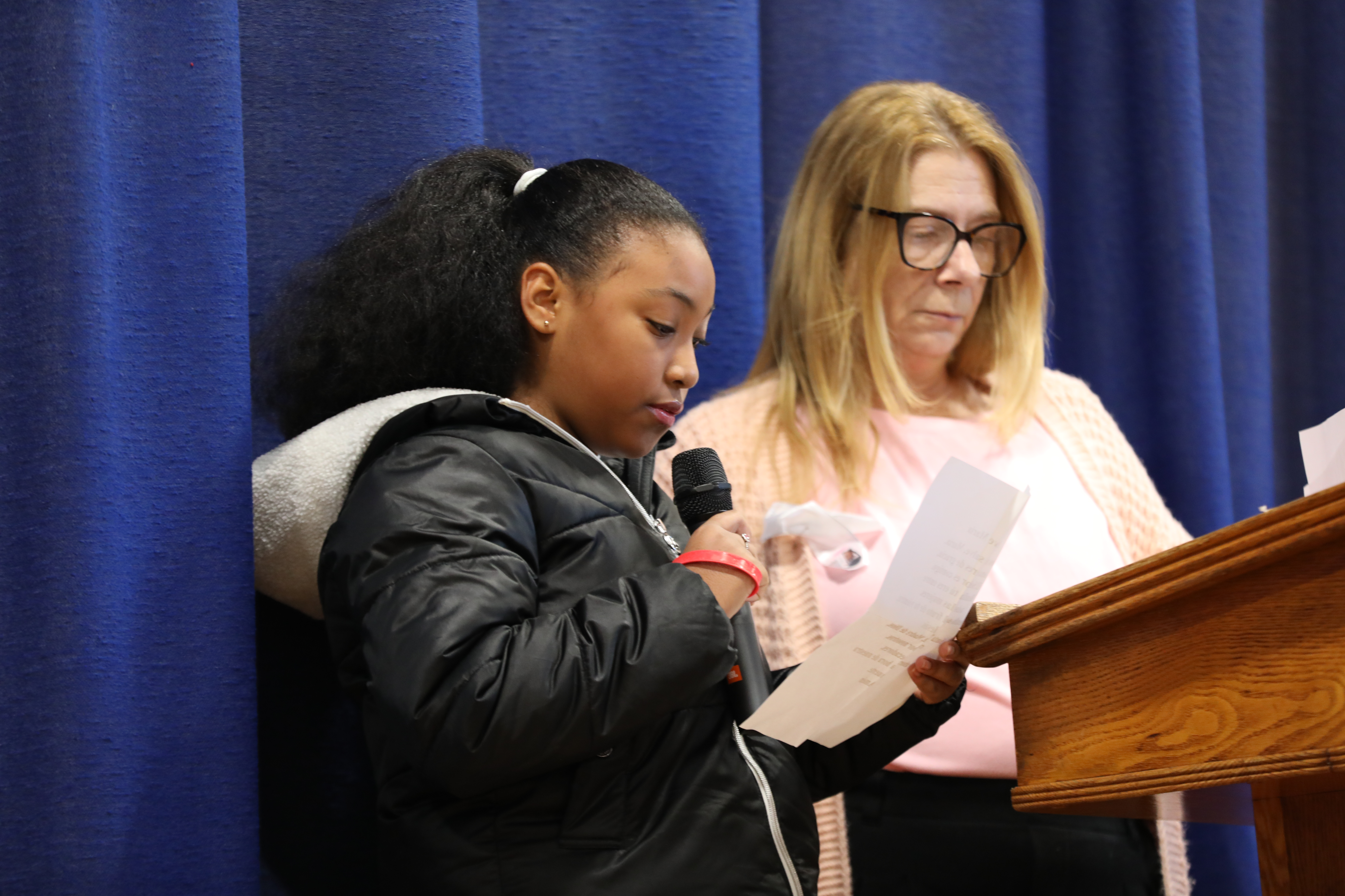 A dedication for Anheli Vasquez-Trinidad was held on Tuesday, Jan. 20 at Father Vincent Capodanno Catholic Academy. Principal Debbie Cretella led the school in remembering the first grader during an assembly with her mother, Father Michael Martine, Jann Amato, classmates, and teachers. (Advance/SILive.com|Jan Somma-Hammel)