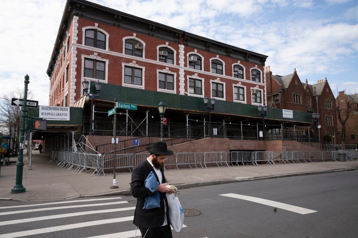A man was arrested after repeatedly crashing his car into the Chabad Lubavitch world headquarters in New York City on Wednesday night while people were gathered for prayer at the deeply revered Hasidic Jewish site.