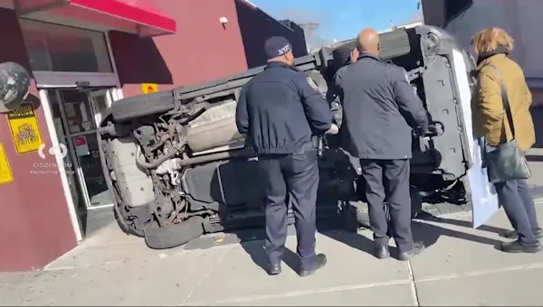 News 12 | Brooklyn | Overturned vehicle outside Park Slope pharmacy; 2 people hospitalized