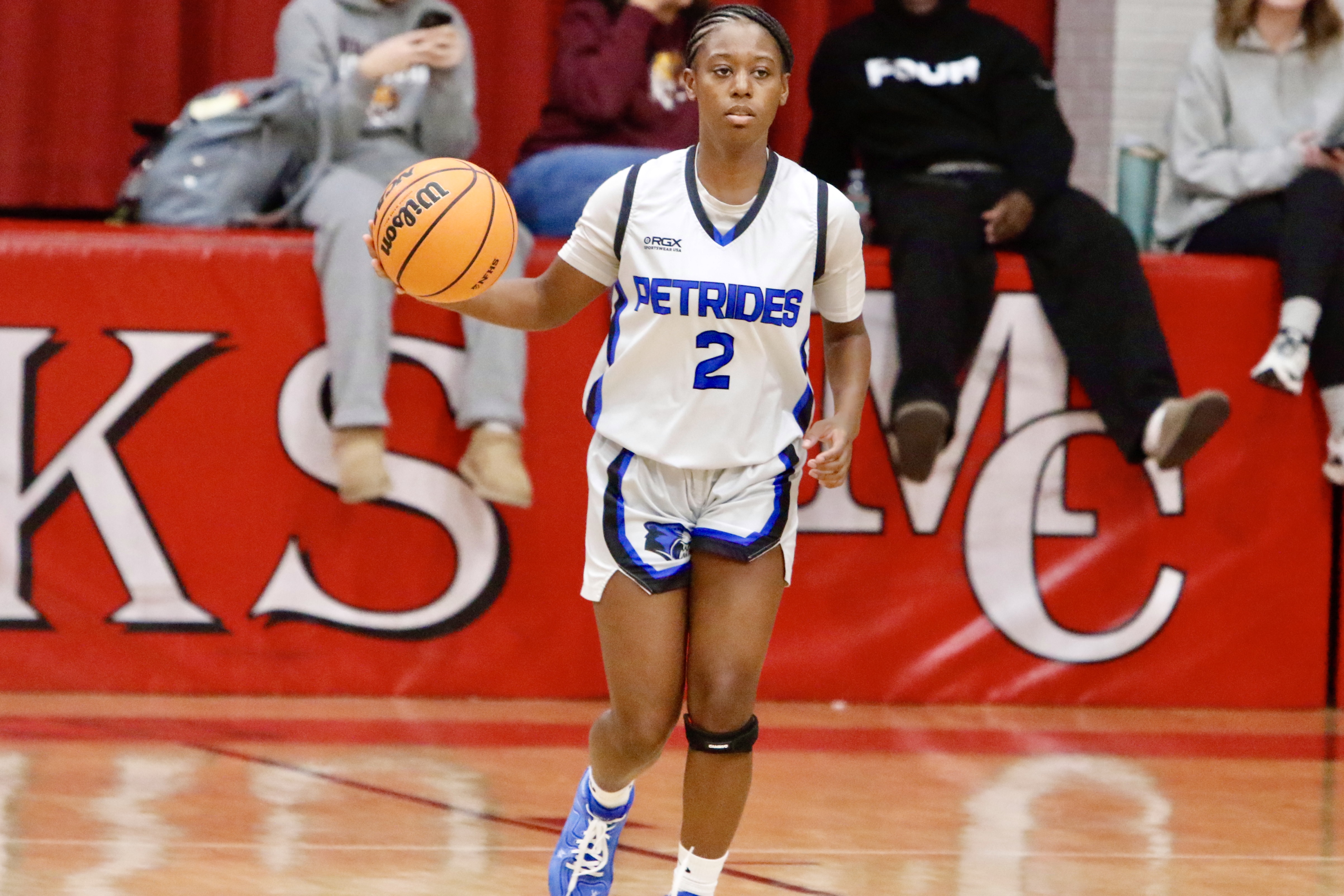 Petrides' Asha Bell brings the ball up the floor during a Borough President's Cup game against CSI/McCown on Jan. 23, 2025.