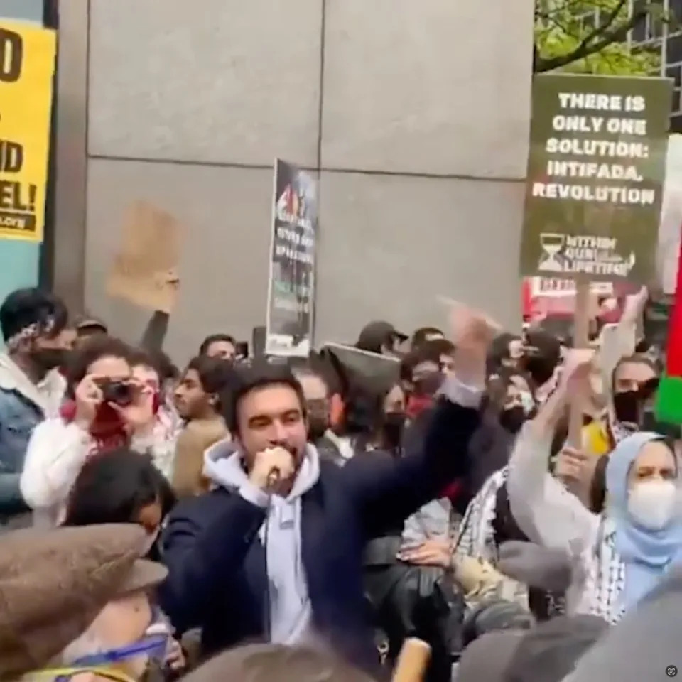 Zohran Mamdani speaking at a Within Our Lifetime Palestine Protest in front of a sign that says “There is only one solution: Intifada revolution,” in a video posted to Instagram on May 12, 2021. Instagram/@zohrankmamdani
