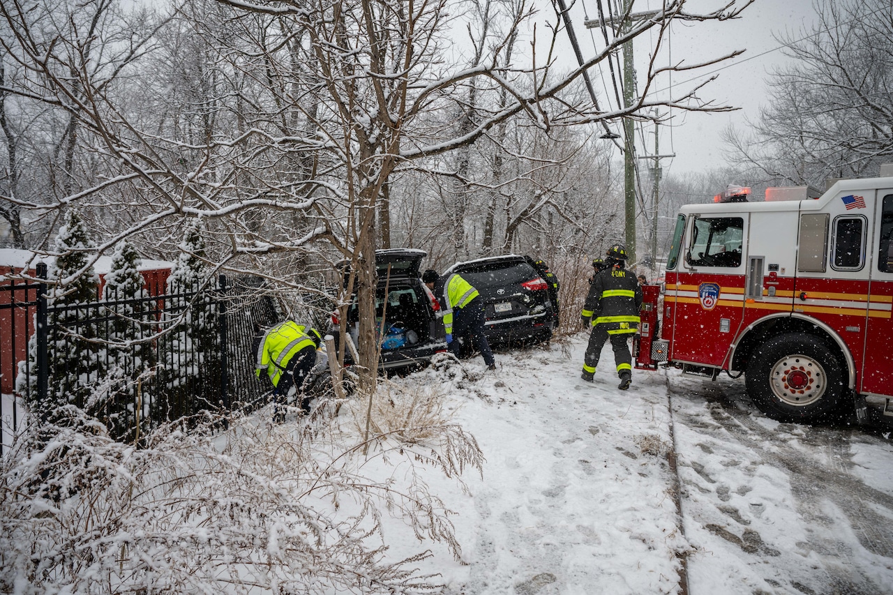 2 injured as cars careen off snowy South Shore road