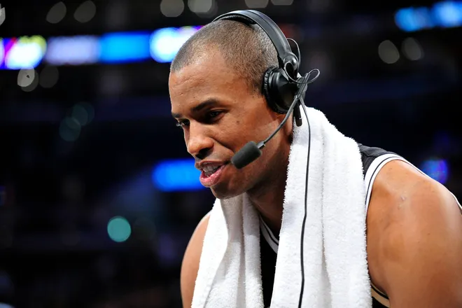 February 23, 2014; Los Angeles, CA, USA; Brooklyn Nets center Jason Collins conducts a radio interview following the 108-102 victory against the Los Angeles Lakers at Staples Center. Mandatory Credit: Gary A. Vasquez-USA TODAY Sports