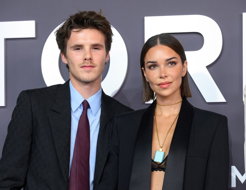 Cruz Beckham and Jackie Apostel attend the "Victoria Beckham" World Premiere at the Curzon Mayfair on October 08, 2025 in London, England