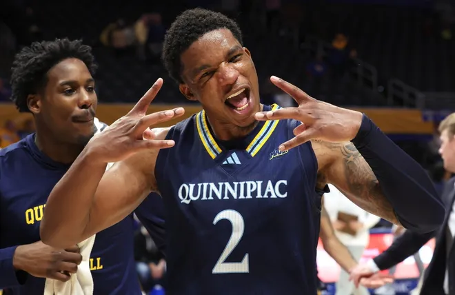 Nov 23, 2025; Pittsburgh, Pennsylvania, USA; Quinnipiac Bobcats forward Amarri Monroe (2) celebrates after defeating the Pittsburgh Panthers at the Petersen Events Center.