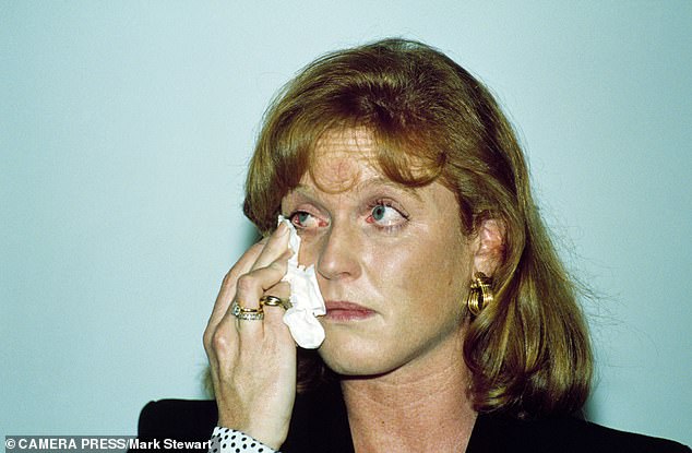 In August 1992, Fergie and John Bryan became enthralled in a notorious 'toe sucking' scandal that saw the former Duchess's public image thrown into further disarray. (Pictured: Fergie appeared tearful at her first public appearance following the scandal)
