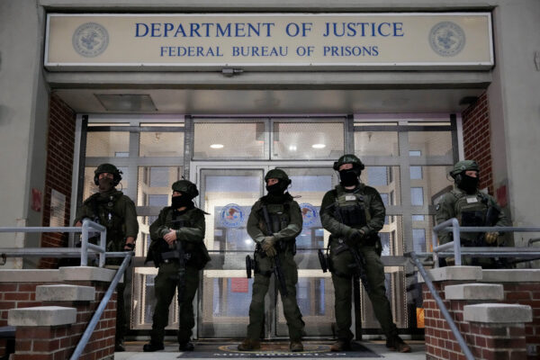Federal law enforcement personnel stand watch outside the Metropolitan Detention Center as they await the arrival of captured Venezuelan President Nicolas Maduro, Saturday, Jan. 3, 2026, in New York. AP Photo/Yuki Iwamura
