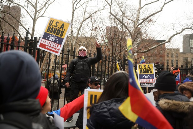 People protest outside Manhattan Federal Court before the arraignment of Venezuelan President Nicolas Maduro, Monday, Jan. 5, 2026, in New York. (AP Photo/Heather Khalifa)