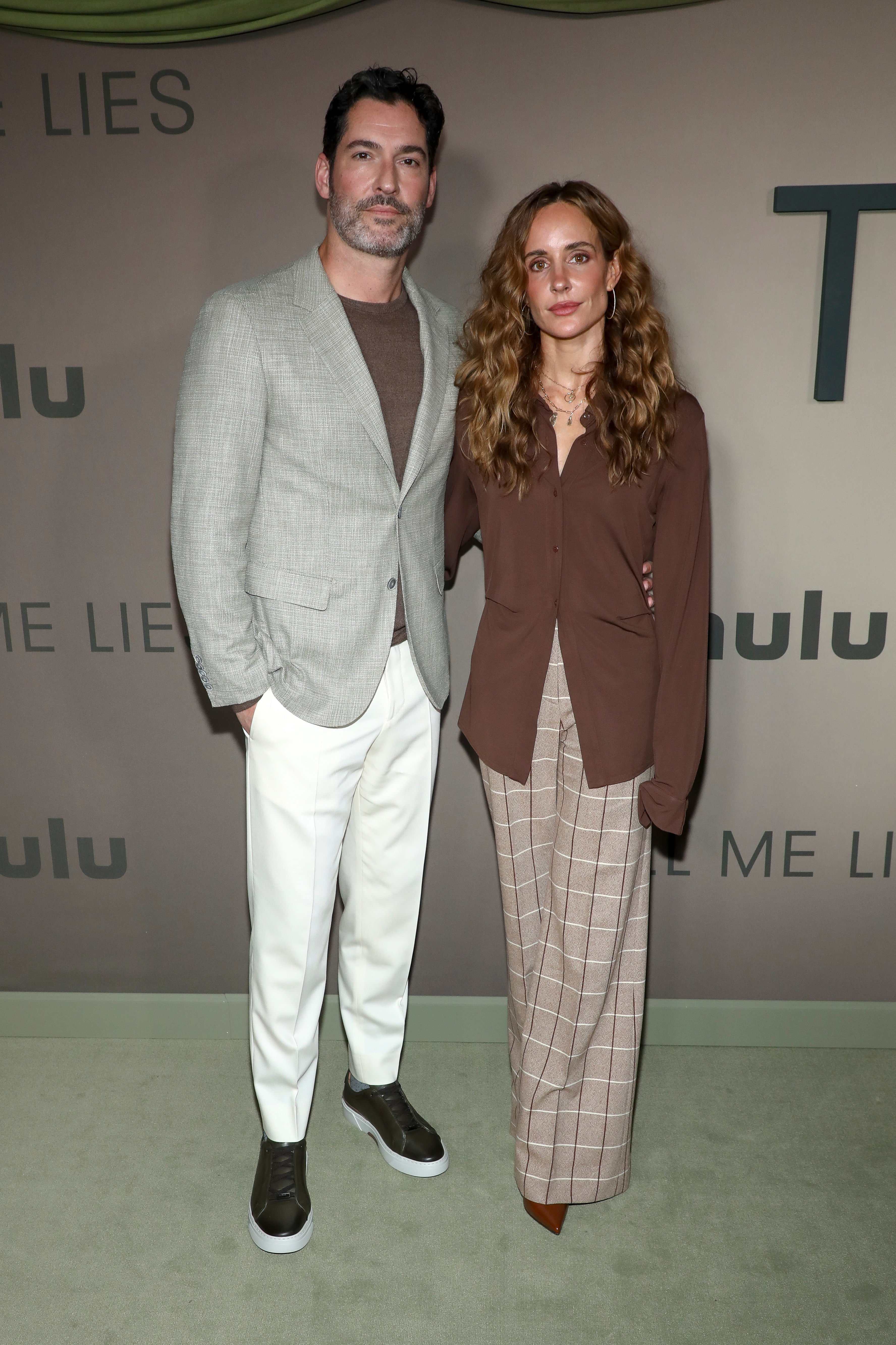 Actor Tom Ellis, left, and producer Meaghan Oppenheimer attend the special screening of Hulu's "Tell Me Lies" Season 3 at The Corner Store on Monday, Jan. 12, 2026, in New York. (Photo by Andy Kropa/Invision/AP)