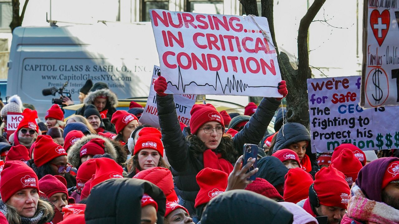 Members of the New York State Nurses Association union picket outside Mount Sinai West Hospital, Tuesday, Jan. 20, 2026, in New York. (AP Photo/Ryan Murphy)