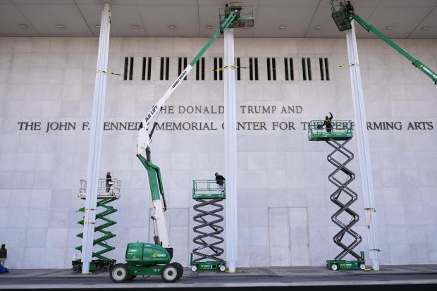 New signage, The Donald J. Trump and The John F. Kennedy Memorial Center For The Performing Arts, is unveiled on the Kennedy Center, Friday, Dec. 19, 2025, in Washington. (AP Photo/Jacquelyn Martin)