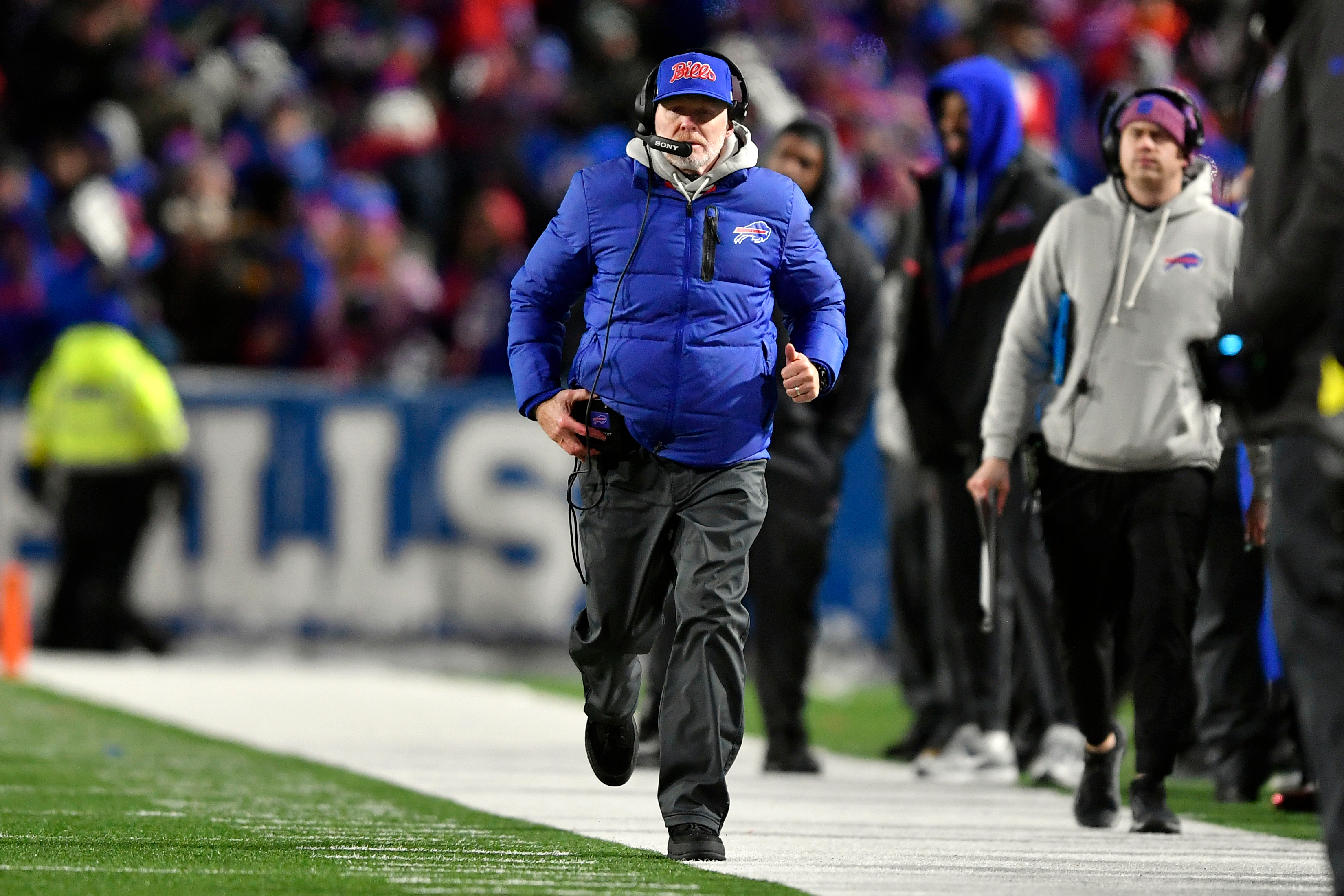 Buffalo Bills head coach Sean McDermott runs down the sideline in the first half of an NFL football game between the Bills and the New York Jets Sunday, Jan. 4, 2026, in Orchard Park, N.Y. (AP Photo/Adrian Kraus)