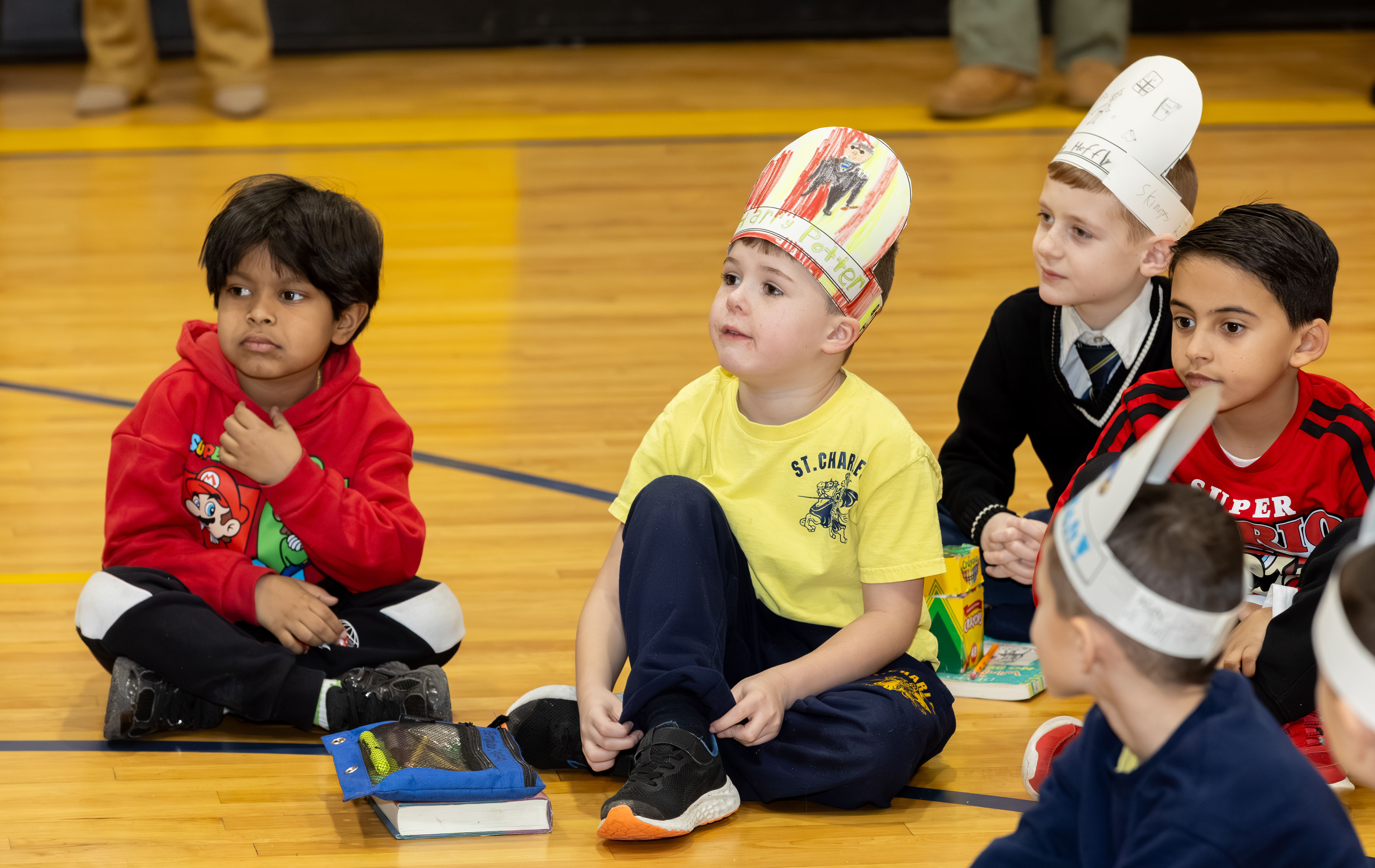 Borough President Vito Fossella and Jann Amato, regional superintendent of the Catholic School Region of Staten Island, celebrate literacy day with first and second graders as part of Catholic Schools Week at the St. Charles School in Oakwood on Wednesday, Jan. 28, 2026 (Advance/SILive.com | Jason Paderon)
