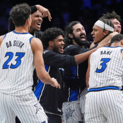 Orlando Magic's Paolo Banchero, right, celebrates with teammates after making a game winning three-point shot during the overtime of an NBA basketball game against the Brooklyn Nets Wednesday, Jan. 7, 2026, in New York. (AP Photo/Frank Franklin II)