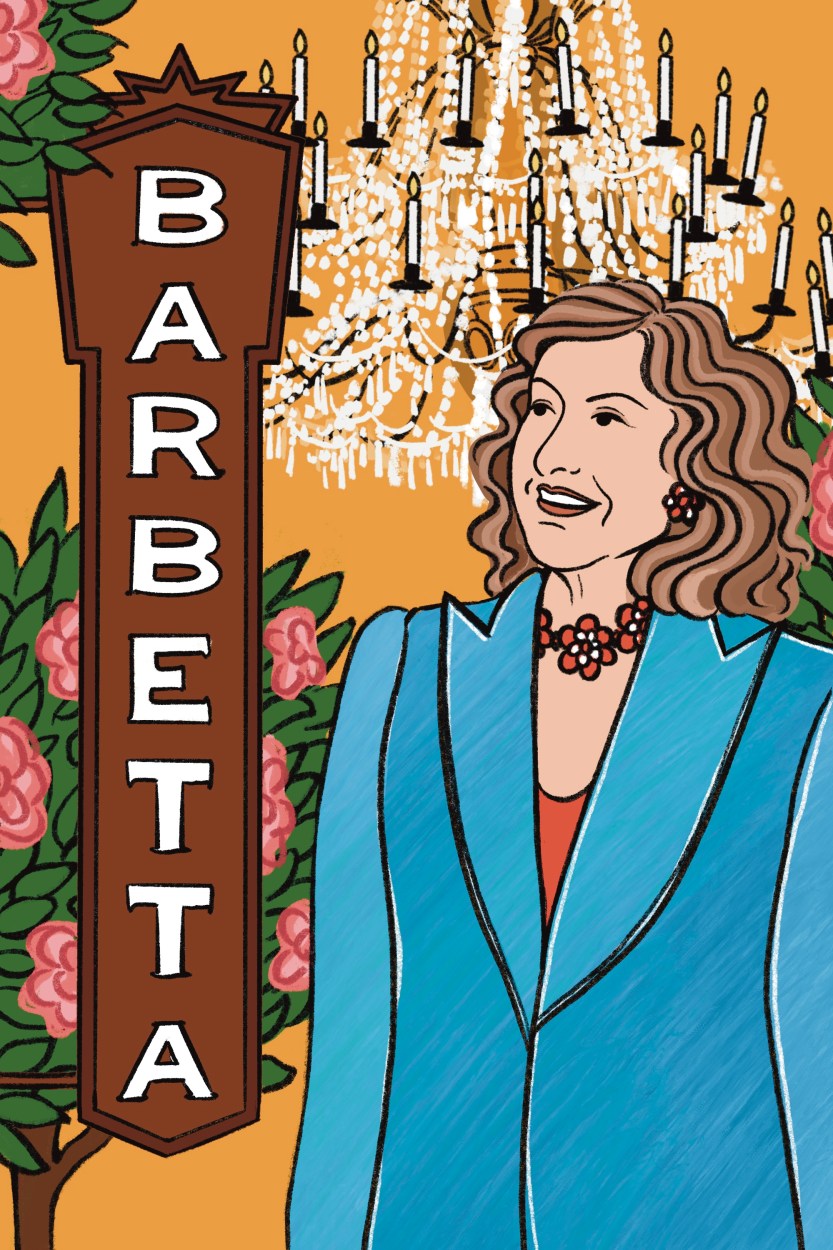 Laura Maioglio smiling with Barbetta sign