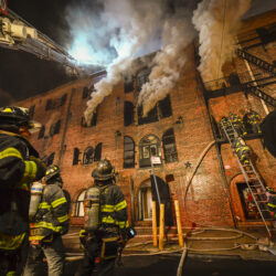 Firefighters at a five-alarm fire at 481 Van Brunt St., the massive, 19th century former warehouse that is now home to the Brooklyn Waterfront Artists Coalition and other commercial and creative tenants. Photo by Marc A. Hermann
