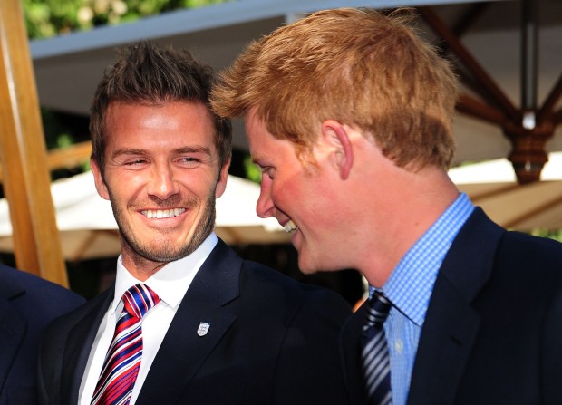 JOHANNESBERG, SOUTH AFRICA - JUNE 19: Prince Harry (R) smiles with David Beckham at an FA reception at the Saxon Hotel on June 19, 2010 in Johannesberg, South Africa. (Photo by Owen Humphreys - WPA Pool/Getty Images)