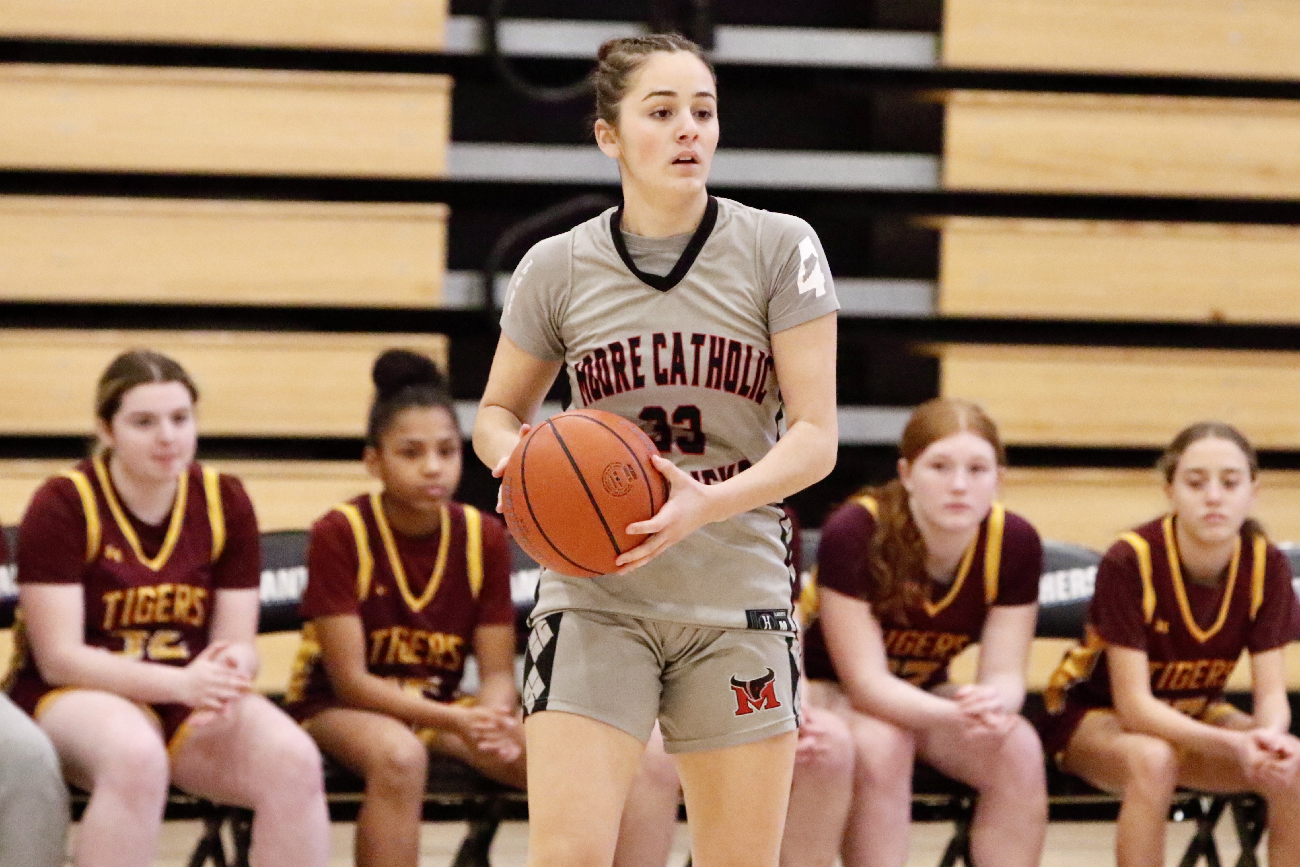 Moore Catholic's Emma Costanzo looks to make a pass during a Borough President's Cup matchup against Staten Island Academy on Jan. 29, 2026.