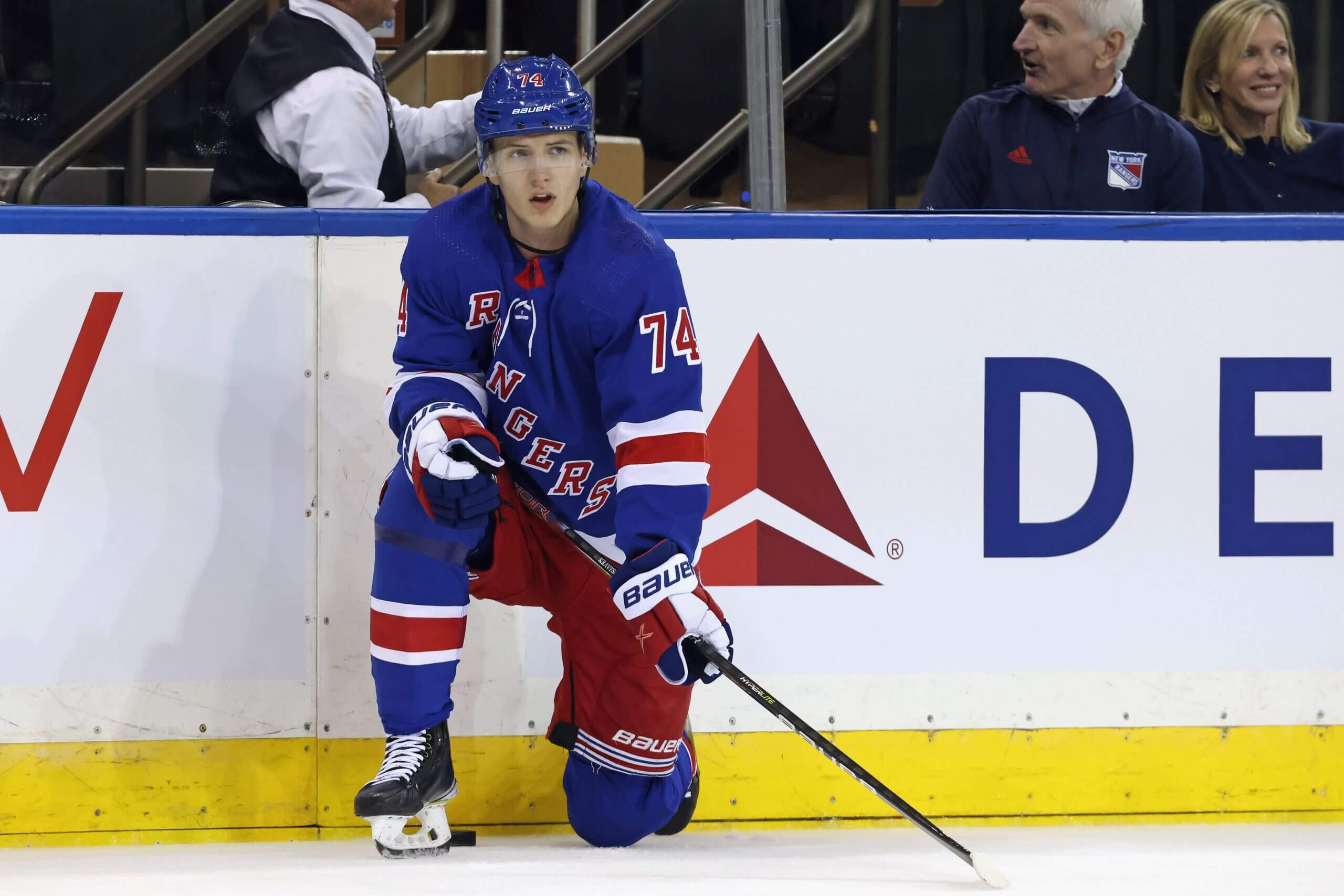 Vitali Kravtsov takes a knee near the boards during Rangers warmups.