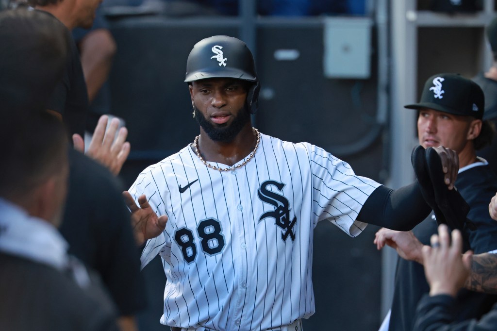  Luis Robert Jr. #88 of the Chicago White Sox celebrates with teammates against the Minnesota Twins at Rate Field on August 23, 2025 in Chicago, Illinois. 