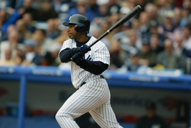 BRONX - APRIL 8: Outfielder Bernie Williams #51 of the New York Yankees swings at a Chicago White Sox pitch during the home opener game at Yankee Stadium on April 8, 2004 in the Bronx, New York. The Yankees won 3-1. (Photo by Al Bello/Getty Images)
