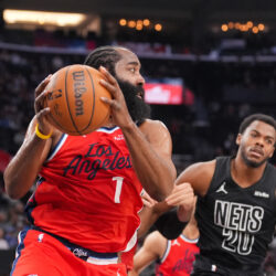 Los Angeles Clippers guard James Harden (1) grabs a rebound during the first half of an NBA basketball game against the Brooklyn Nets Sunday, Jan. 25, 2026, in Inglewood, Calif. (AP Photo/Jae C. Hong)