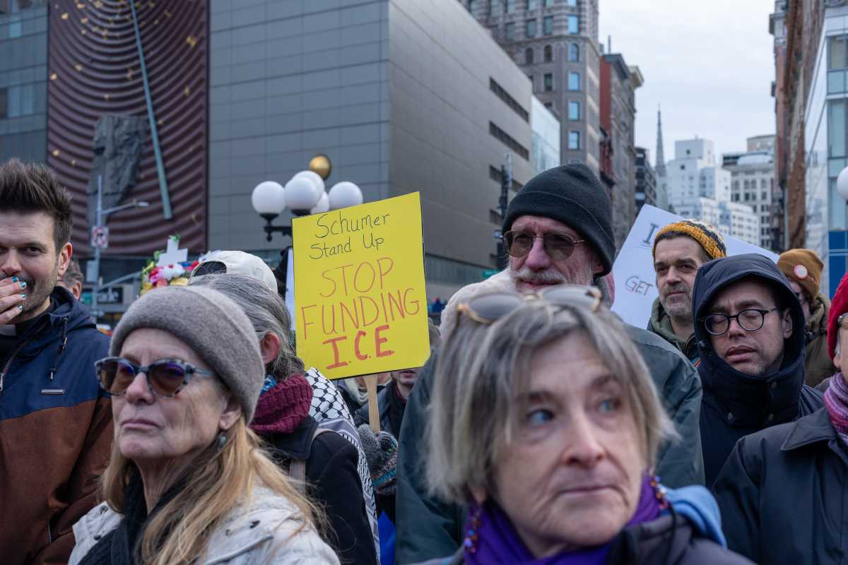 People marching against ICE in Minnesota and New York