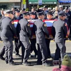 Pallbearers carry the casket of FDNY Deputy Chief Jim Riches. Brooklyn Eagle photo by Wayne Daren Schneiderman
